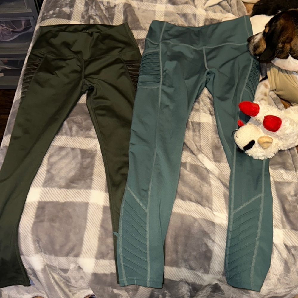 Workout leggings, both with side pockets and both are long